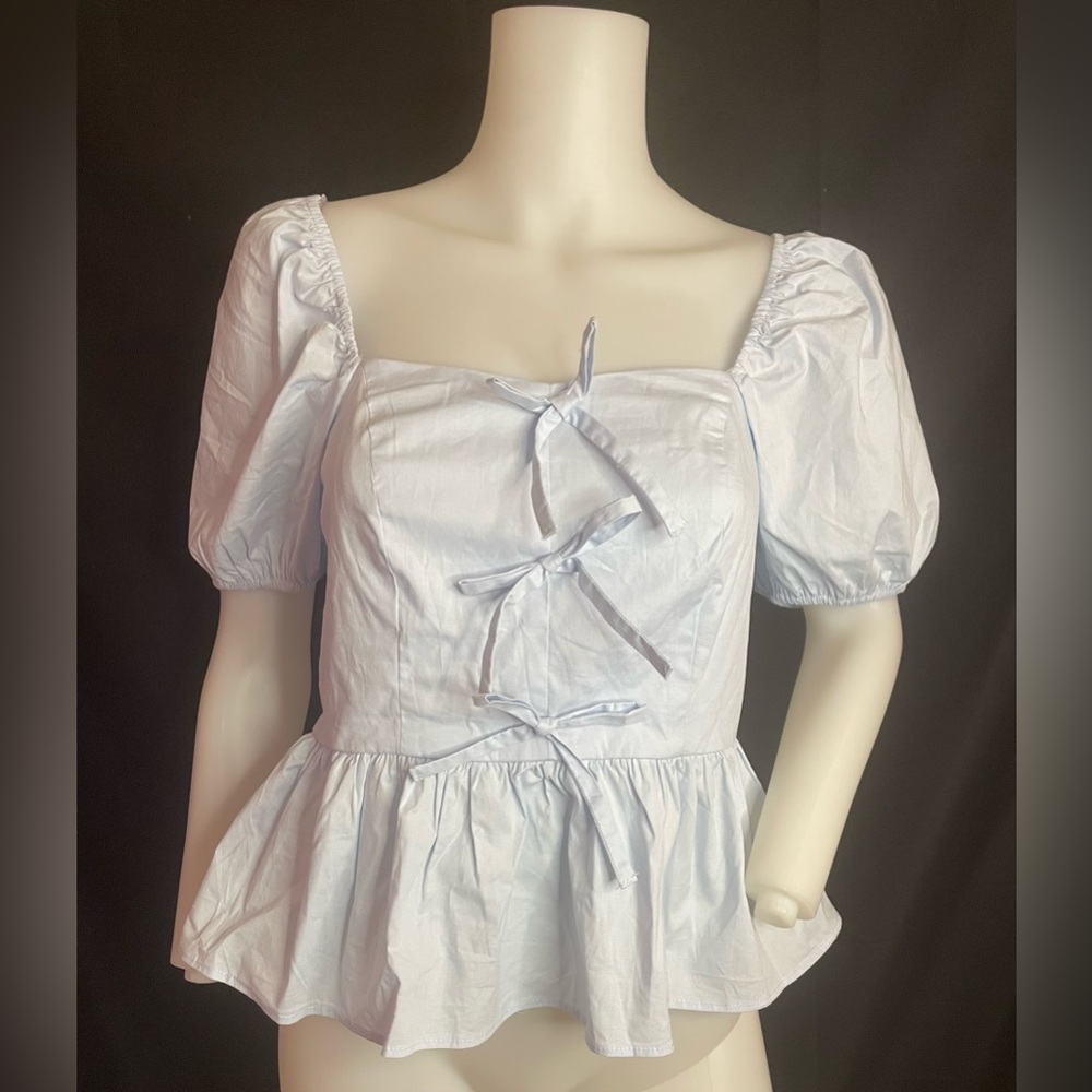 Francesca's sky blue ruffle shirt three bows down the front puffy sleeves.sz sm